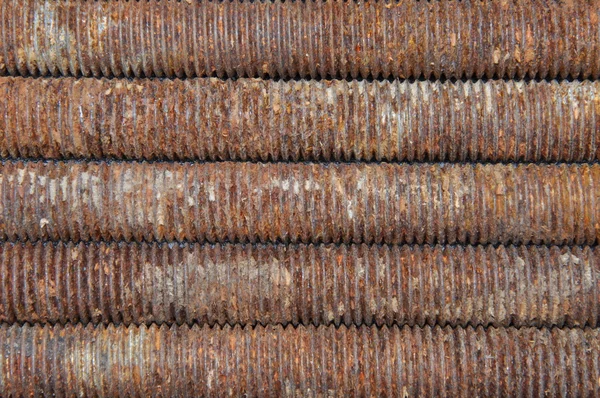 Rusted bolts as background — Stock Photo, Image