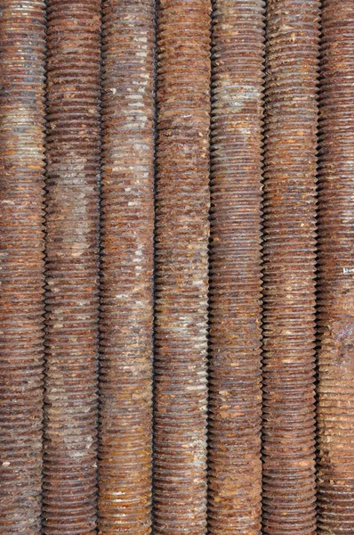 Rusted bolts as background — Stock Photo, Image