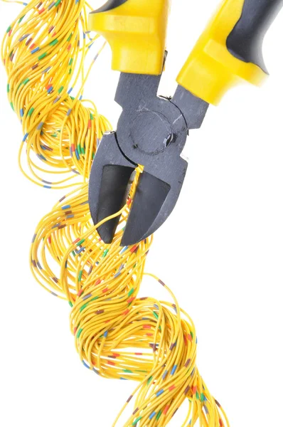 Yellow metal nippers and cable — Stock Photo, Image