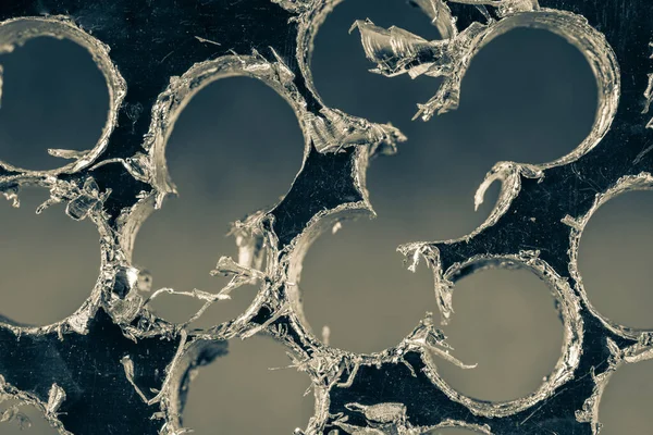 Drilled metal surface, macro view