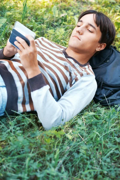 Young man with his pocket computer — Stock Photo, Image