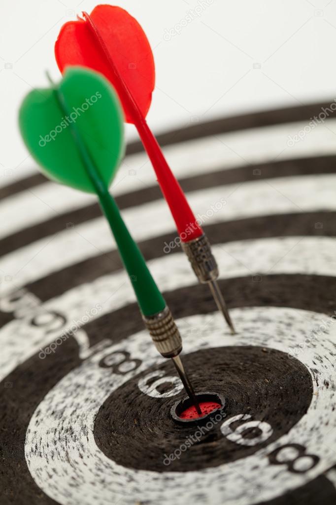 Two darts on a dartboard