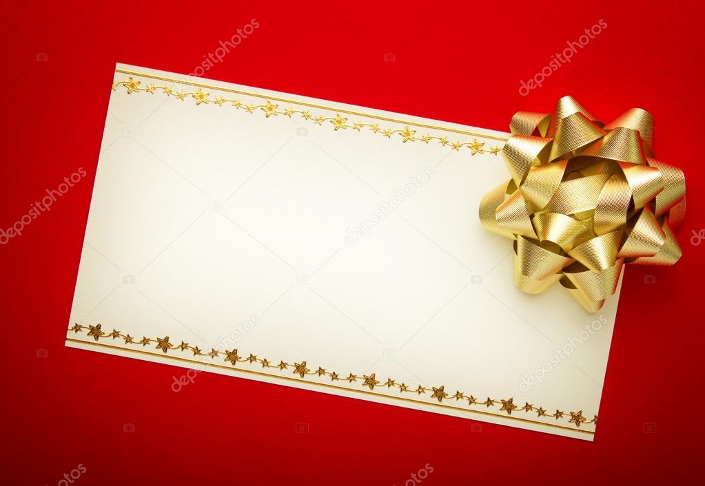Greeting card on red paper with gold bow