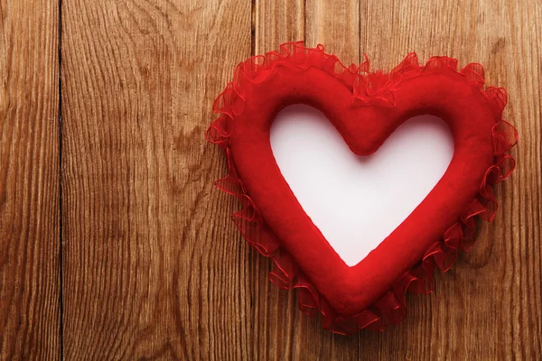 Red heart on wood with copy space — Stock Photo, Image