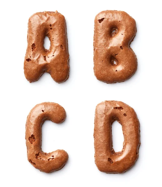 Letters made of caramel cookies — Stock Photo, Image
