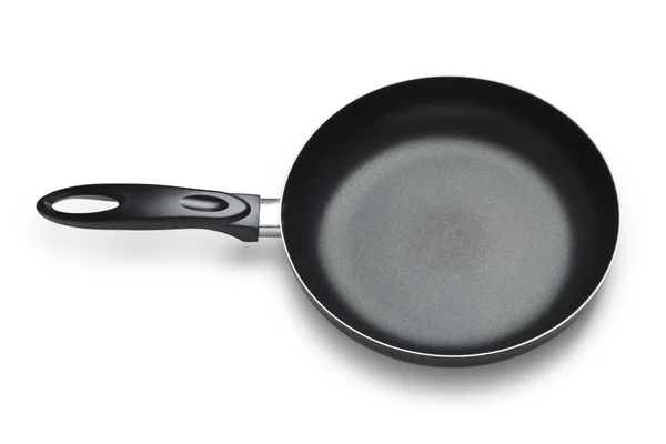 Black frying pan isolated on white background, with path — Stock Photo, Image