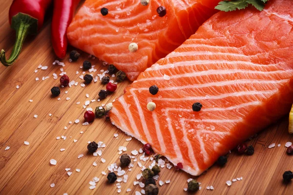 Salmon filet with fresh herbs — Stock Photo, Image