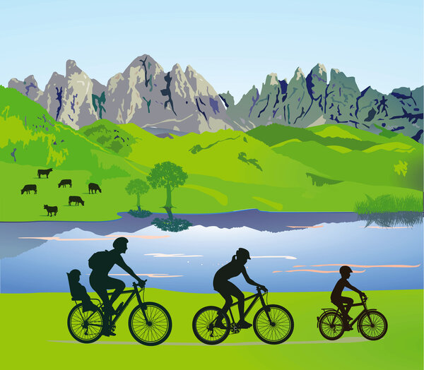 Родители с детьми во время езды на велосипеде