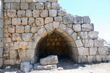 Nimrod Fort National Park  Lancet arches made of stone blocks in the walls and towers of the fortress