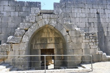 Nimrod Fort National Park  Lancet arches made of stone blocks in the walls and towers of the fortress