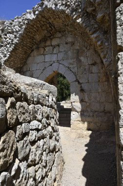 Nimrod Fort National Park  Lancet arches made of stone blocks in the walls and towers of the fortress