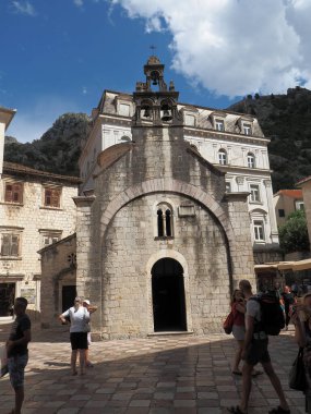 Kotor is a city in Montenegro, located on the limestone cliffs of Mount Lovcen on the Adriatic coast. In the medieval Old Town, surrounded by a fortress wall, many squares, winding streets and several Romanesque churches