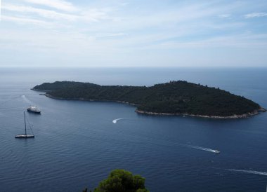 Dubrovnik is a Croatian city on the Adriatic coast and an old town surrounded by massive sixteenth century stone walls.