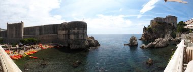 Dubrovnik is a Croatian city on the Adriatic coast and an old town surrounded by massive sixteenth century stone walls.