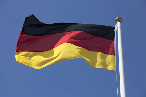 Germany flag on blue sky — Stock Photo, Image