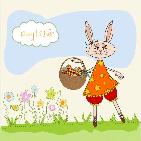 Easter bunny with a basket of Easter eggs — Stock Photo, Image