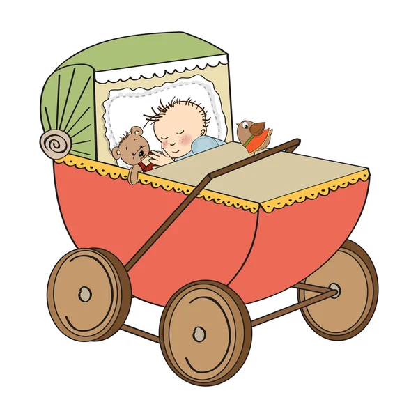 Babyjongen in retro wandelwagen geïsoleerd op witte achtergrond — Stockfoto