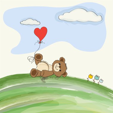 şirin doodle oyuncak ayı ile çayır üzerinde kalp