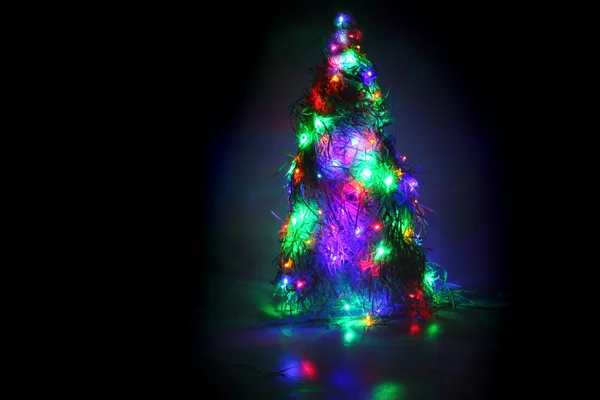 Árvore de natal formar a cor luzes xmas — Fotografia de Stock