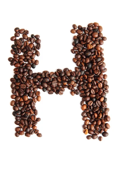 H - алфавит из кофейных зерен — стоковое фото