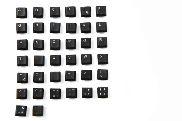 Alphabet aus Tastaturtasten als Schrift — Stockfoto