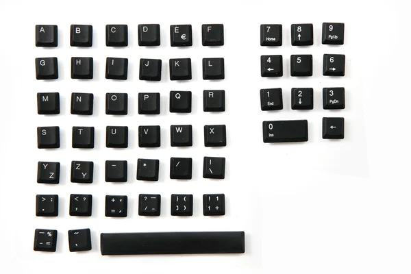 Алфавит из клавиш клавиатуры как шрифт — стоковое фото