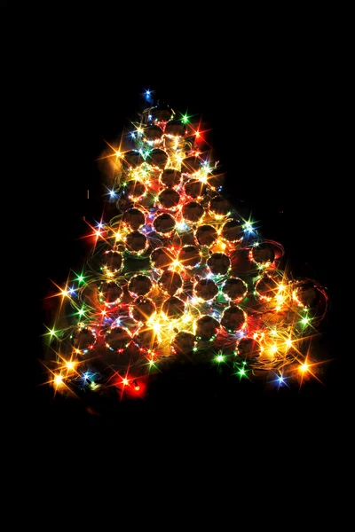 Árbol de Navidad en la noche oscura —  Fotos de Stock