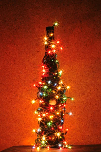 Vánoce v červené noční láhev — Stock fotografie