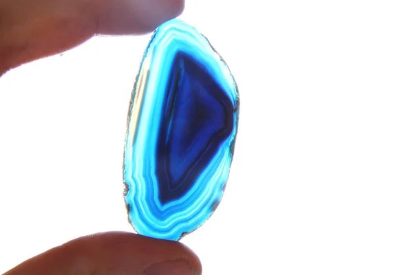 Agate gem in human hand — Stock Photo, Image