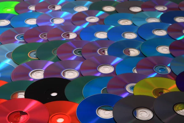 Color CD and DVD background — Stock Photo, Image