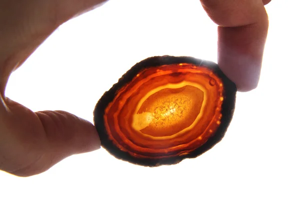 Agate in my fingers — Stock Photo, Image