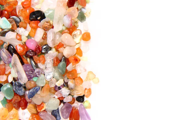 Pequenas pedras preciosas de cor como fundo agradável — Fotografia de Stock