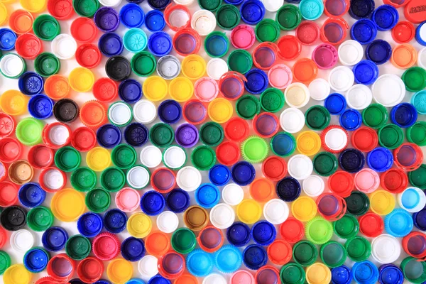 Color plastic caps from pet bottles — Stock Photo, Image