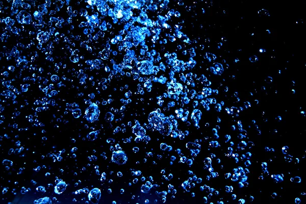 Gotas de agua en color azul —  Fotos de Stock