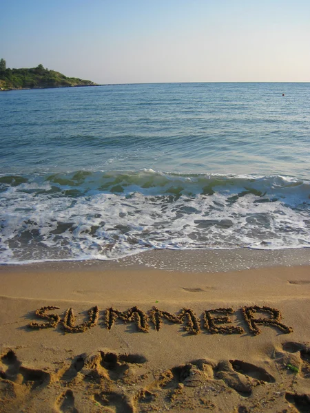 Sommar - text i sanden — Stockfoto