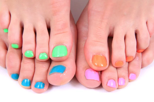 Pedicure (color nails) and women feet — Stock Photo, Image