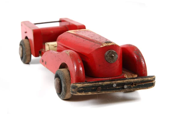 Viejo juguete rojo del coche de madera — Foto de Stock