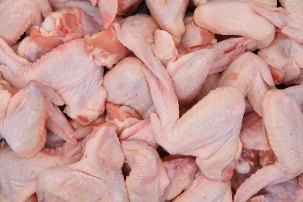 Ali di pollo crudo cibo sfondo — Foto Stock