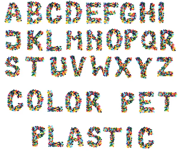 Алфавит из пластиковых колпачков — стоковое фото