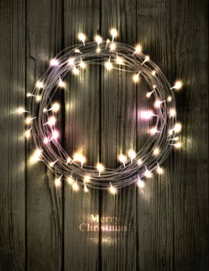 LED ışıkları yapılmış parlak Noel çelenk