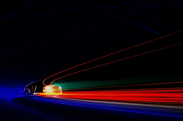Abstract colorful lights in car tunnel — Stock Photo, Image