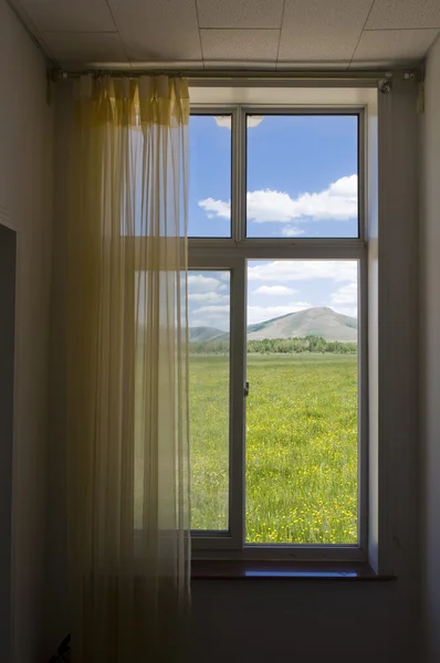 Landscape looked through from a window — Stock Photo, Image