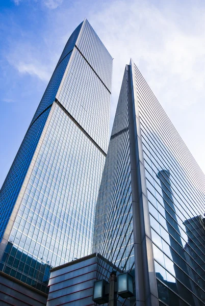 Highrise glass building with sky and clouds reflection — Stock Photo, Image