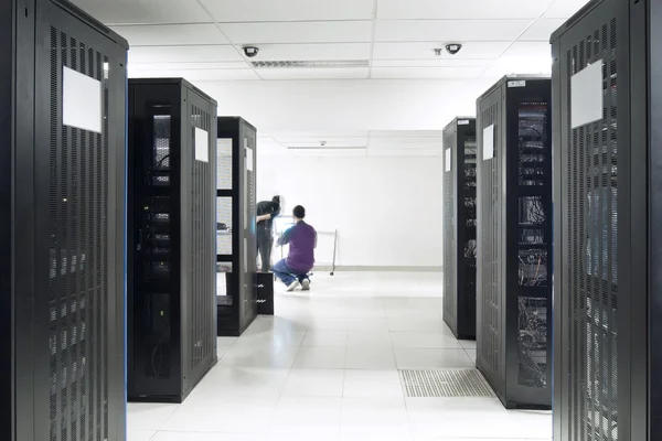 A server room with black servers — Stock Photo, Image