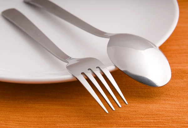 Closeup of a place setting with dinner-plate — Stock Photo, Image