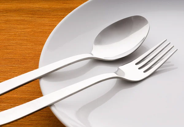 Closeup of a place setting with dinner-plate — Stock Photo, Image