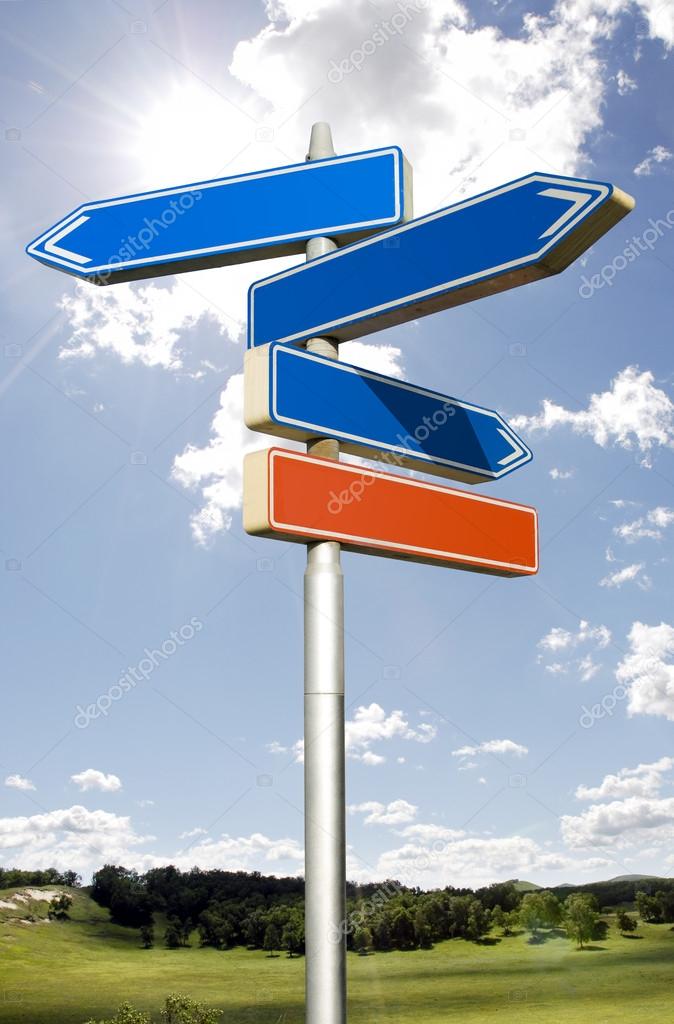 Roadsign with empty direction arrows isolated on sky