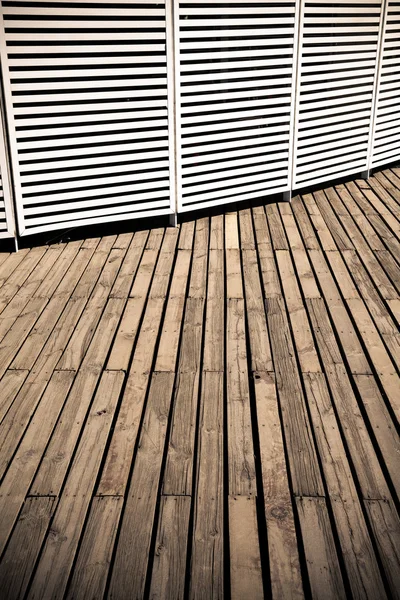 White fence screen and wooden floor background — Stock Photo, Image