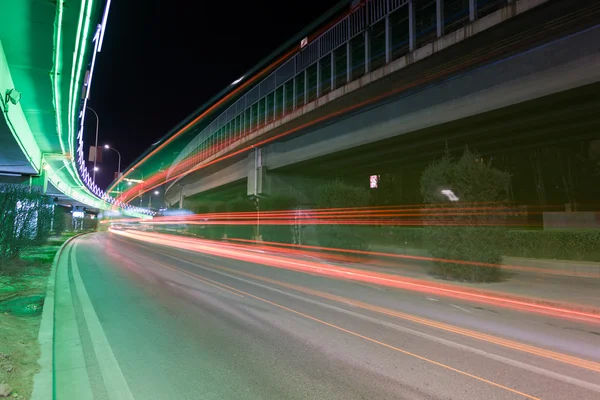 Light traces on traffic junctions at night — Stock Photo, Image