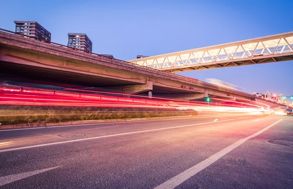 Light traces on traffic junctions at night — Stock Photo, Image